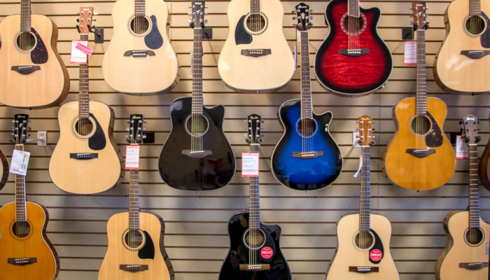 Wall display of acoustic guitars.