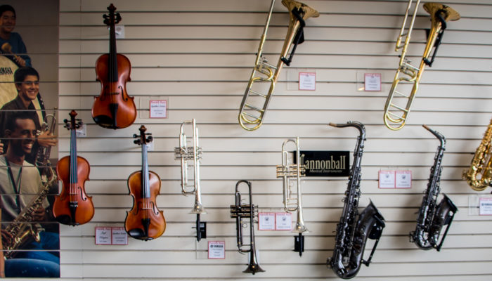 Wall display of band and orchestra instruments.