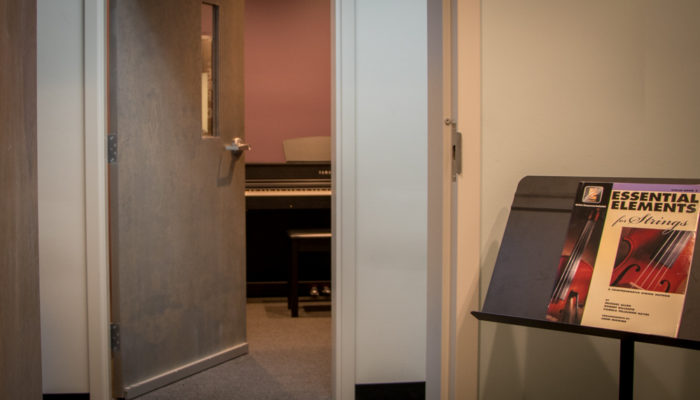 Private lesson studio with piano.