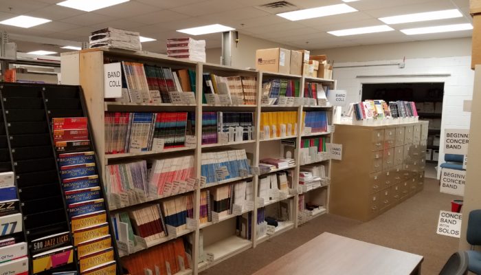 Display of band methods and band arrangements on shelving.