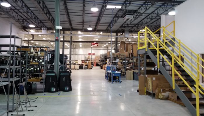 Wide view of music instrument warehouse.