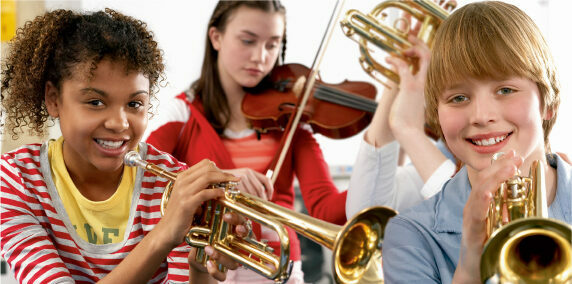 Students with trumpets and a violin