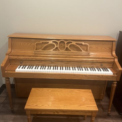 kawai oak 43 inch console piano front view 1