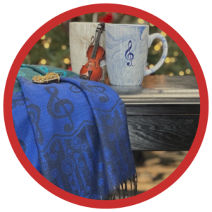 Image of accessories include a scarf, two mugs, a violin holiday ornament, and a saxophone holiday ornament.