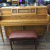 Yamaha M402 Oak front view with bench key cover closed
