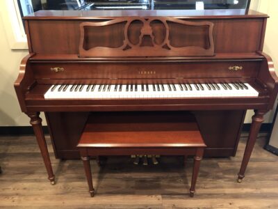 Yamaha mahogany M500 piano front view