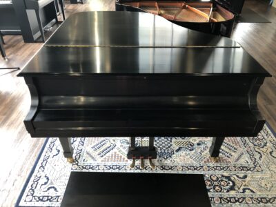 A fully closed view of the Boston GP163II satin ebony grand.