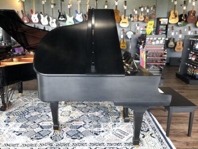 A view of the fully opened lid on a Boston GP163II satin ebony grand.