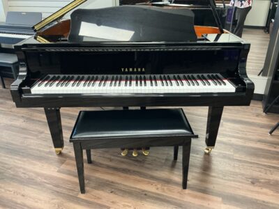 Yamaha GB1K-PE front view with top up and bench