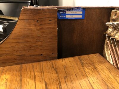 The serial and model number of the Baldwin, model 1024, #1376388 pecan upright.