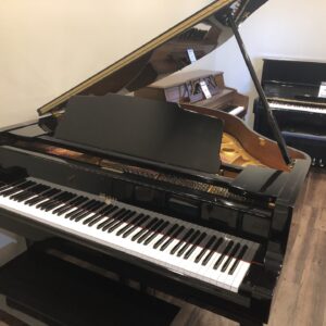 The front view of the Weber, WG150PE baby grand with matching bench.