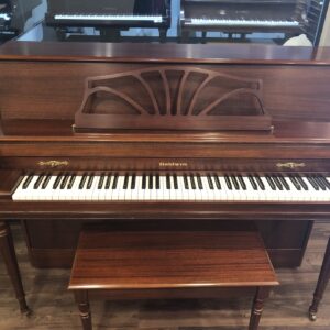 The front view of the Baldwin_660_Mahogany_1547323 with matching bench.