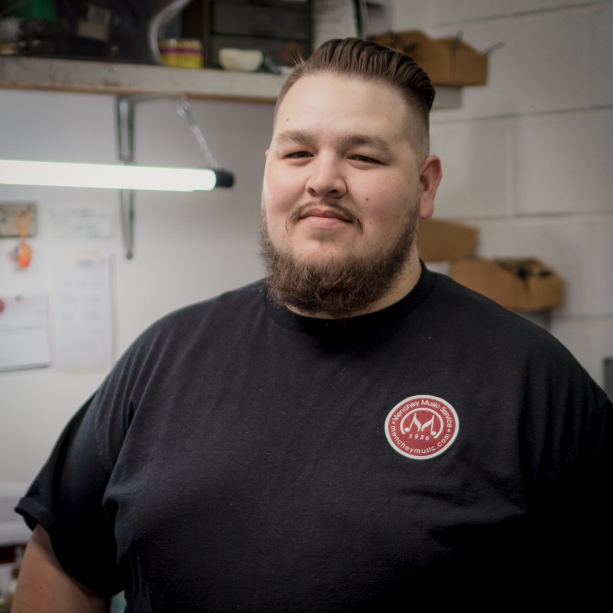 Photo of Tim, the lead brass tech for Menchey Music Service